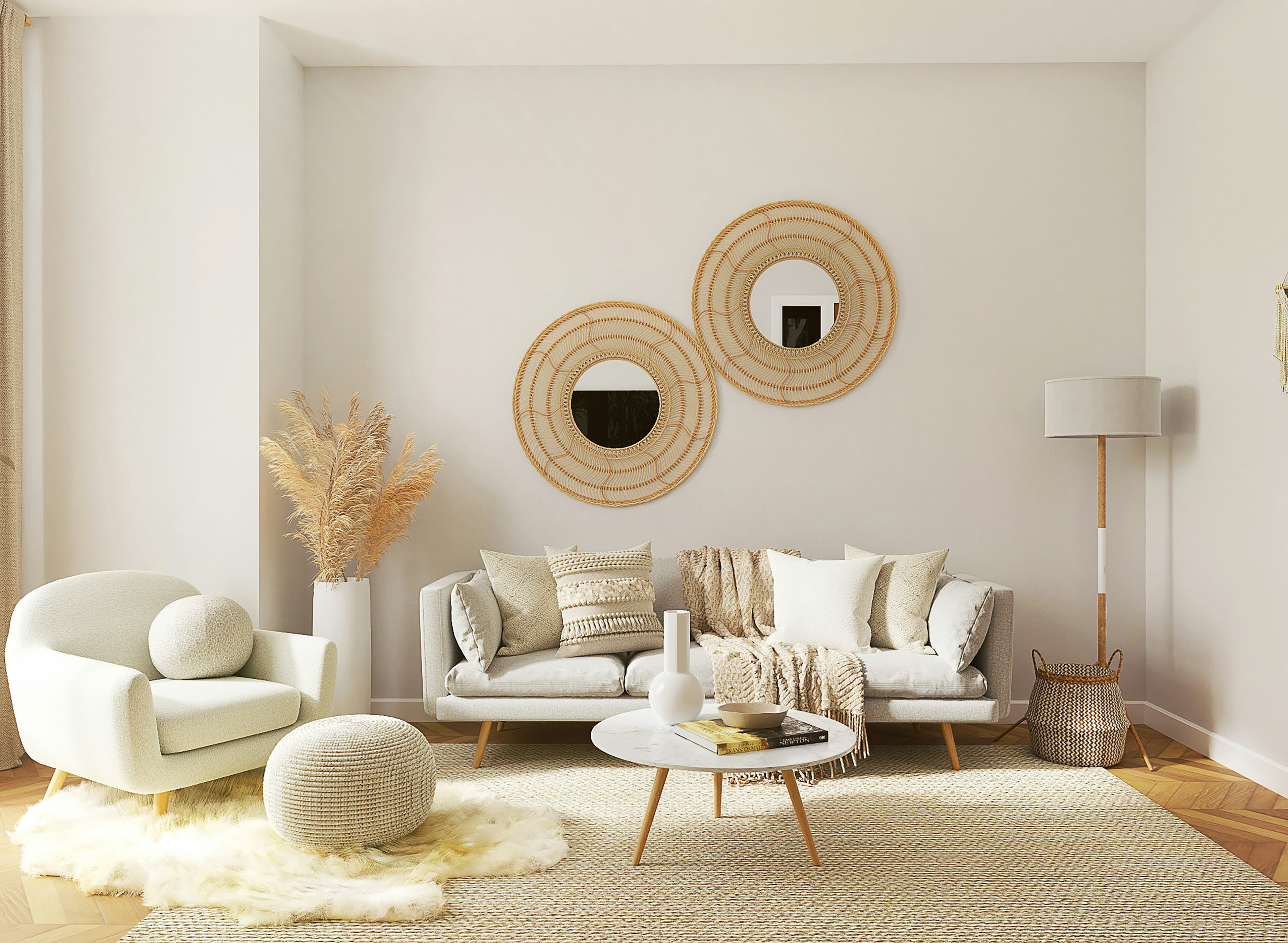 A light-filled living room with woven wall mirrors, neutral seating and layered natural textures